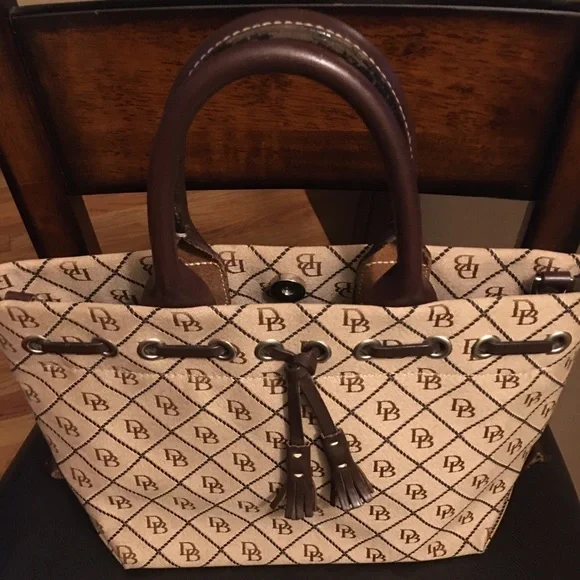 Dooney and Burke Tassel tote. - Picture 1 of 6